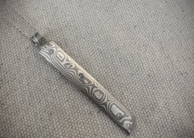 pendentif mokume gane argent-palladium, dimants gris-blancs